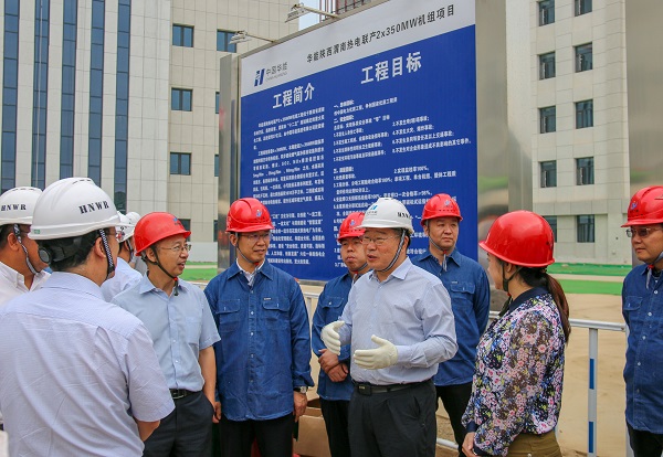 1  祝总一行与华能明博在线(中国)基建部主任马洪顺亲切交流.jpg